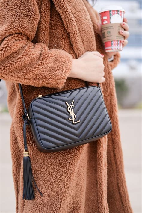 ysl lou camera bag celebrities